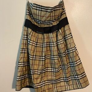 Molly B Burberry like dress with black bow detail.